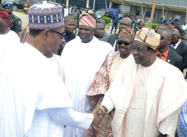 PIC.6. PRESIDENT BUHARI VISITS IBADAN ENROUTE OSUN PIC.6. FROM LEFT: PRESIEDENT MUHAMADU BUHARI; GOV. AKINWUNMI AMBODE OF LAGOS STATE; A MEMBER OF THE HOUSE OF REPRESENTATIVES, REP. ROTIMI AGUNLOYE; AND DEPUTY GOVERNOR OF OYO STATE, CHIEF MOSES ADEYEMO, DURING THE ARRIVAL OF PRESIDENT MUHAMADU BUHARI AT IBADAN AIRPORT ENROUTE OSOGBO ON HIS STATE VISIT TO OSUN ON THURSDAY (1/9/16). 5698/1/9/2016/MA/JAU/BJO/NAN