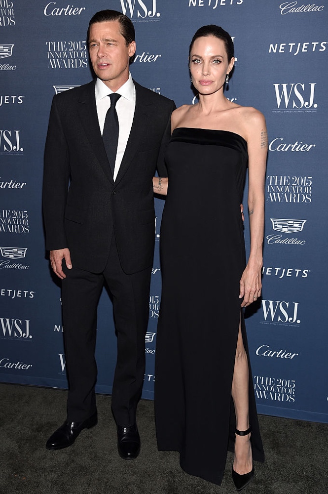 NEW YORK, NY - NOVEMBER 04: 2015 Entertainment Innovator Angelina Jolie Pitt (R) and Brad Pitt attend the WSJ. Magazine 2015 Innovator Awards at the Museum of Modern Art on November 4, 2015 in New York City. (Photo by Dimitrios Kambouris/Getty Images for WSJ. Magazine 2015 Innovator Awards)