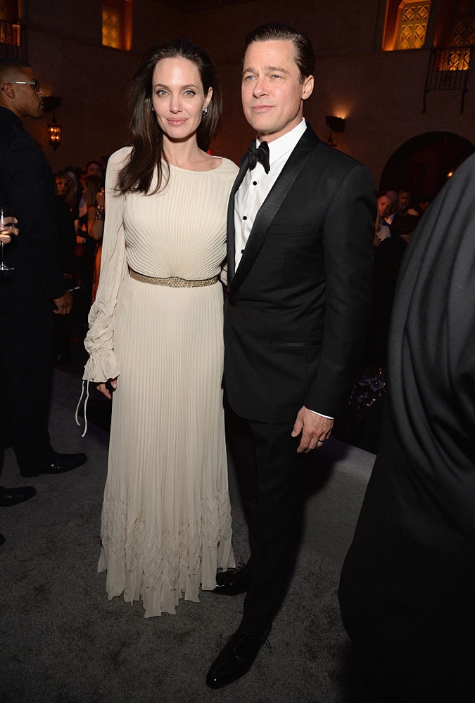 HOLLYWOOD, CA - NOVEMBER 05: Writer-director-producer-actress Angelina Jolie Pitt (L) and actor-producer Brad Pitt attend the after party for the opening night gala premiere of Universal Pictures' "By the Sea" during AFI FEST 2015 presented by Audi at TCL Chinese 6 Theatres on November 5, 2015 in Hollywood, California. (Photo by Michael Kovac/Getty Images for AFI)