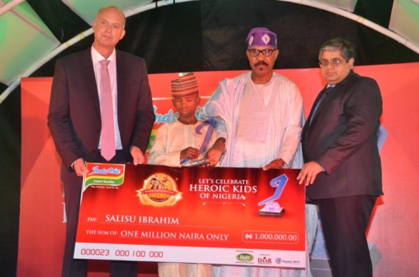 l-r: head, arla foods sub-saharan africa, mr. steen hadsbjerg; winners, social bravery category, 2016 indomie independence day awards for heroes ofnigeria (iida), salisu ibrahim; senator olurunnimbe mamora and group managing director, dufil prima foods plc, mr deepak singhal at the 2016 iida held in lagos.