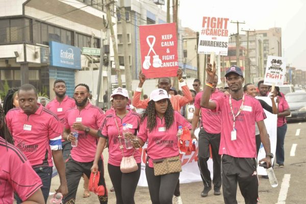 Annie Idibia, Moc Madu and Runcie C.W. Chidebe, Executive Director of Project PINK BLUE at the Pink October Walk in Ikeja Lagos