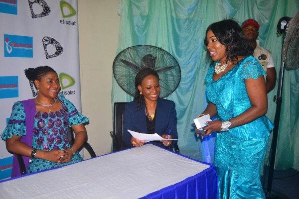 Cross River State First Lady-Dr Mrs Linda Ayade, Manager-CSR-Etisalat Nigeria-Oyetola Oduyemi and DG CRSPHDA- Dr Betta Edu after signing the MOU