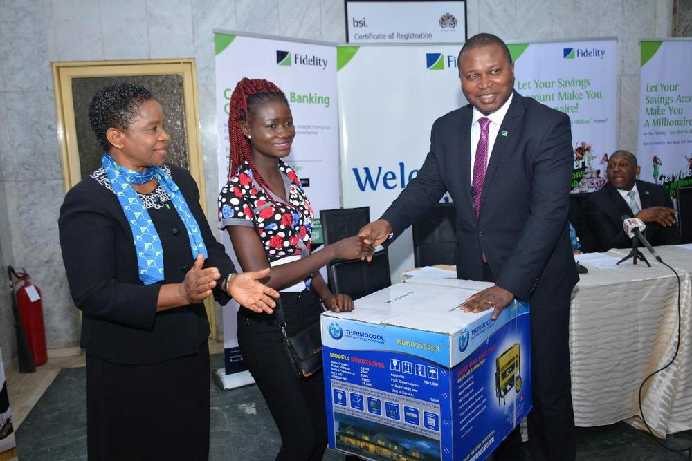 L-R, Janet Nnabuko, Group Head, Savings; Zainab Abiodun Jimoh, Winner of Generator Set and Richard Madiebo, Divisional Head, Retail Bank during the prize presentation ceremony in Lagos