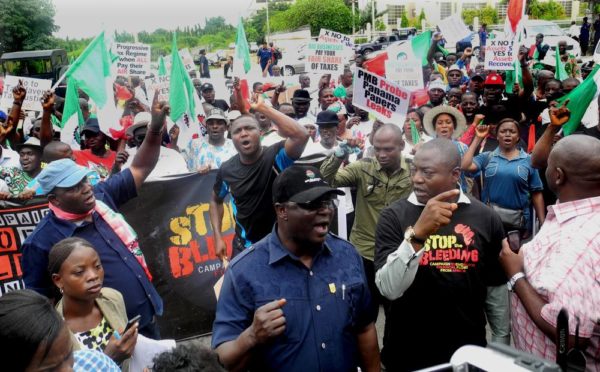 Pic.11. National president of the Nigeria Labour Congress (NLC), Commrade Ayuba Wabba leading a rally to protest and demand for tax justice in Africa, on Wednesday (12/10/16/) in Abuja. 7618/12/10/2016/Deborah Bada/BJO/NAN