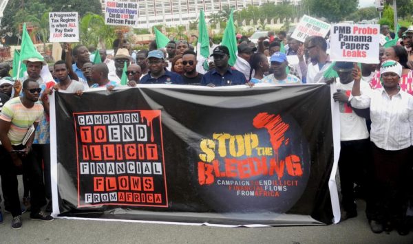 Pic.12. National president of the Nigeria Labour Congress (NLC), Commrade Ayuba Wabba (m) leading other members of the union in a rally to protest and demand for tax justice in Africa, on Wednesday (12/10/16/) in Abuja. 7619/12/10/2016/Deborah Bada/BJO/NAN