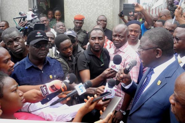 Pic.13. The acting permanent secretary, Federal Ministry of Finance, Mr Muhammed Dikwa (r) addressing members of the Nigeria Labour Congress (NLC) during a protest to demand for tax justice in Africa, on Wednesday (12/10/16/) in Abuja. 7620/12/10/2016/Deborah Bada/BJO/NAN