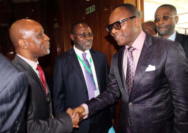 Pic.15. The Managing Director/Chief Executive Officer of Frontier Oil Limited, Dada Thomas (L) welcoming the Minister of State for Petroleum, Ibe Kachikwu to the opening of the 10th International Conference and Exhibition of the Nigerian Gas Association (NGA), in Abuja on Monday (31/10/16). Middle is the president of NGA and Managing Director of Oando Gas and Power, Bolaji Osunsanya. 8093/31/10/2016/Jones Bamidele/NAN