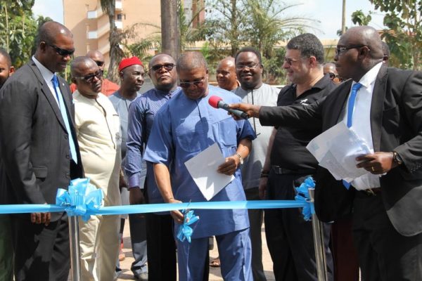 Engr. Ndubueze Enekwa cutting the ribbon to officially open the refurbished branch in Enugu