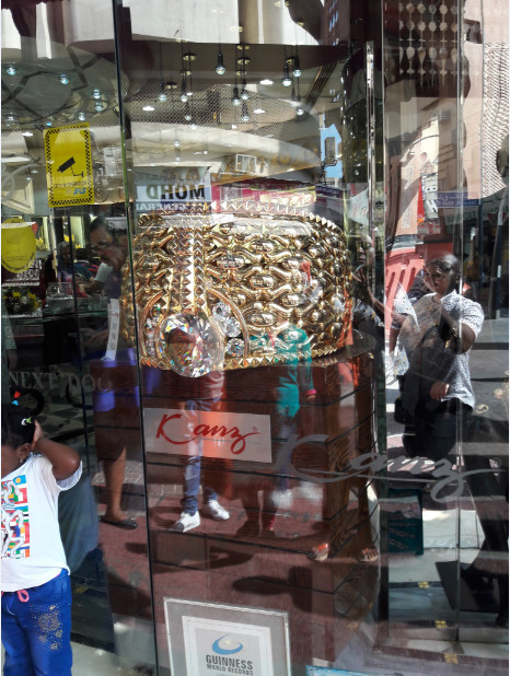 The World's heaviest Gold Ring - Najmat Taiba. Mounted on 5.17kg of precious stones and set on a 58.686kg 21 carat Gold ring, It was created by Taiba for Gold and Jewellery Co., Ltd.