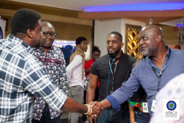 filmmaker-kunle-afolayan-welcoming-some-foregn-guests-at-the-ongoing-afriff-2