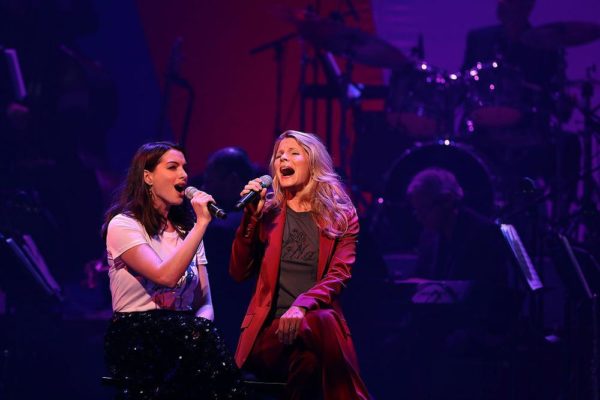 NEW YORK, NY - OCTOBER 17: Anne Hathaway (L) and Kelli O'Hara perform during the Hillary Victory Fund - Stronger Together concert at St. James Theatre on October 17, 2016 in New York City. Broadway stars and celebrities performed during a fundraising concert for the Hillary Clinton campaign. (Photo by Justin Sullivan/Getty Images)