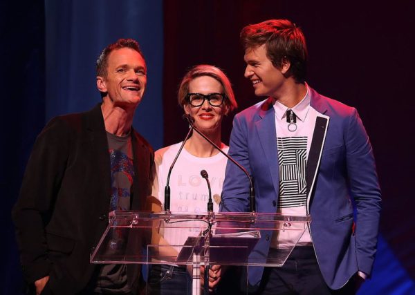 NEW YORK, NY - OCTOBER 17:  (L-R) Actors Neil Patrick Harris, Sarah Paulson and Ansel Elgort appear on stage during the Hillary Victory Fund - Stronger Together concert at St. James Theatre on October 17, 2016 in New York City. Broadway stars and celebrities performed during a fundraising concert for the Hillary Clinton campaign.  (Photo by Justin Sullivan/Getty Images)