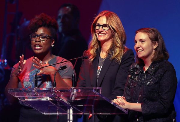 NEW YORK, NY - OCTOBER 17: (L-R) Actresses Uzo Aduba, Julia Roberts and Lena Dunham appear on stage during the Hillary Victory Fund - Stronger Together concert at St. James Theatre on October 17, 2016 in New York City. Broadway stars and celebrities performed during a fundraising concert for the Hillary Clinton campaign. (Photo by Justin Sullivan/Getty Images)