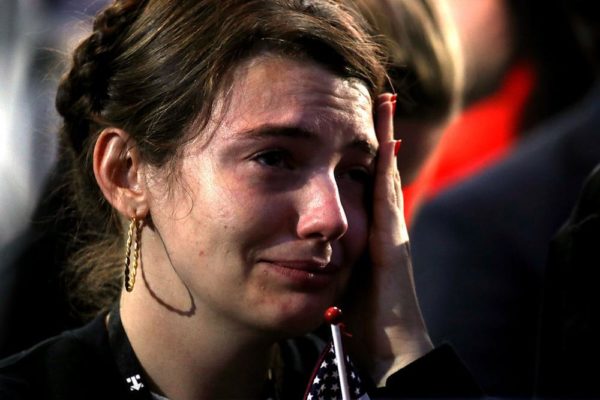 NEW YORK, NY - NOVEMBER 08:  A woman reacts as she watches voting results at Democratic presidential nominee former Secretary of State Hillary Clinton's election night event at the Jacob K. Javits Convention Center November 8, 2016 in New York City. Clinton is running against Republican nominee, Donald J. Trump to be the 45th President of the United States.  (Photo by Win McNamee/Getty Images)