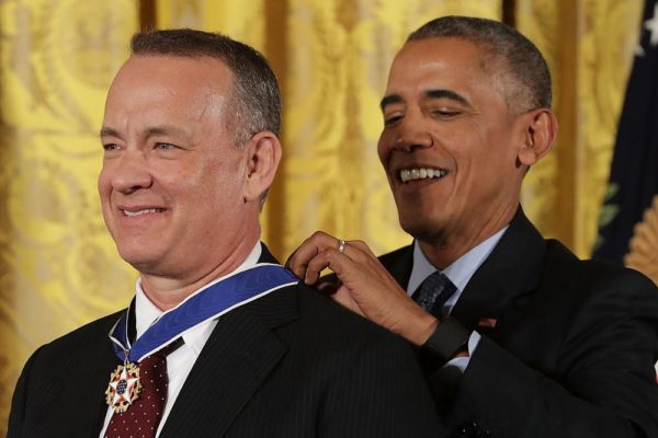 WASHINGTON, DC - NOVEMBER 22: U.S. President Barack Obama awards the Presidential Medal of Freedom to Academy Award winner, filmmaker and social justice advocate Tom Hanks during a ceremony in the East Room of the White House November 22, 2016 in Washington, DC. Obama presented the medal to 19 living and two posthumous pioneers in science, sports, public service, human rights, politics and the arts. (Photo by Chip Somodevilla/Getty Images)