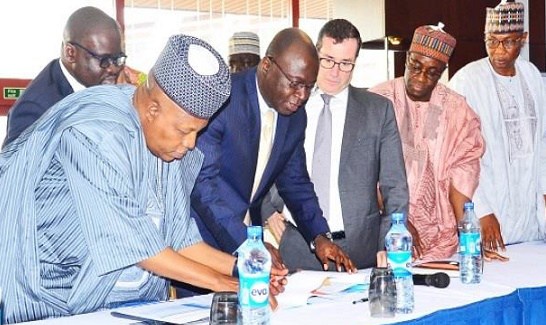 From left: Chairman, Northern States Governors'' Forum, Governor Kashim Shettima of Borno State; President/Chief Executive Officer, General Electric, Nigeria, Dr Lazarus Angbazo; General Electric''s Senior Executive, Western Europe & Africa, Mr Armand Pineda; and the CEO, Northern Nigeria Global Economic Re-integration Programme, Tanimu Yakubu Kurfi at the signing of an MOU between General Electric and the northern governors for the construction of five solar power plants Photo: Dailytrust