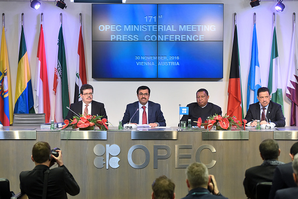 From left to right, Mohamed Hamel, chairman of OPEC, Mohammed Al-Sada, Qatar's minister of energy and industry and president of OPEC, Mohammed Barkindo, secretary general of OPEC, and Hasan Hafidh, head of public relations of OPEC, attend a news conference following the 171st Organization of Petroleum Exporting Countries (OPEC) meeting in Vienna, Austria, on Wednesday, Nov. 30, 2016. Oil rose the most in nine months after OPEC ministers were said to have forged a deal to cut production, sending stocks of energy producers and currencies of commodity-exporting nations higher. Photographer: Akos Stiller/Bloomberg via Getty Images