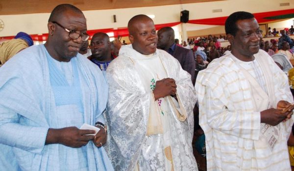 Pic 8. From Left:  Minister of Solid Minerals, Kayode Fayemi; Parish Priest of Saint Monica's Catholic Church, Rev. Fr. John Okoro and  Gov. Simon Lalong of Plateau  during the Churchs Harvest and thanksgiving service in Jos on Sunday (13/11/2016).  8319/13/11/2016/ Sunday Adah /TA/NAN