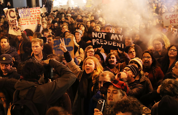 NEW YORK, NY - NOVEMBER 09: Thousands of anti-Donald Trump protesters shut down 5th Avenue in front of Trump Tower as New Yorkers react to the election of Trump as president of the United States on November 9, 2016 in New York City. Trump defeated Democrat Hillary Clinton in an upset to become the 45th president. (Photo by Spencer Platt/Getty Images)
