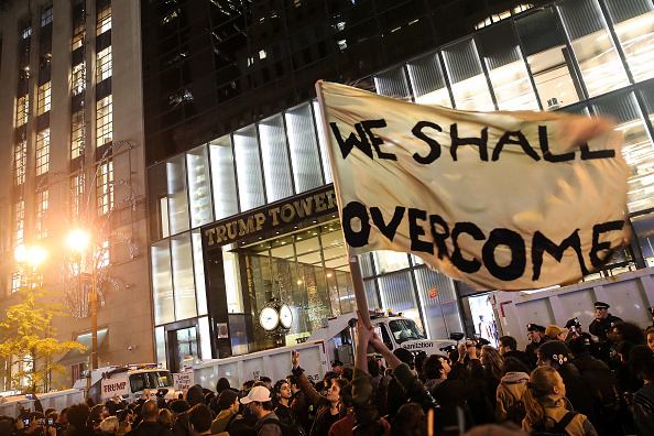 NEW YORK, NY - NOVEMBER 9: Hundreds of protestors rallying against Donald Trump gather outside of Trump Tower, November 9, 2016 in New York City. Republican candidate Donald Trump won the 2016 presidential election in the early hours of the morning in a widely unforeseen upset. (Photo by Drew Angerer/Getty Images)