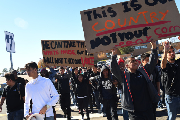 DENVER, CO -NOVEMBER 09: Students from Martin Luther King High School walk back to school after joining students form Denver's Noel Community Arts School to protest Donald Trumps election win, November 09, 2016. Some of the students fear being deported or their families being deported with Trump as president. (Photo by RJ Sangosti/The Denver Post via Getty Images)