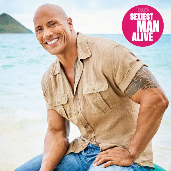 Sexiest Man Alive 2016 Dwayne Johnson The Rock photographed in Kailua, Hawaii on September 13, 2016 Photographer: Jeff Lipsky Barber: Rachel Solow Makeup: Merc Arceneaux/Merc Beauty Inc. Prop Stylist: Chris Reiner Stylist: Robert Mata Shirt: John Varvatos† Jeans: AG Jeans†