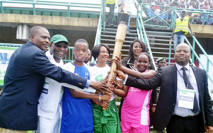 L-R: Director-General of School Sports, Lagos State Sport Commission, Mr. Moses Kolawole; Managing Director/CEO, Heritage Bank, Ifie Sekibo; Heritage Bank-Lagos State Skoolimpics Torch Bearer, Momore Opawole; Heritage Bank-Lagos State Skoolimpics Ambassador, Mary Onyali; Torch Bearer, Favour Ojo and Representative of Lagos State Commissioner for Sports and Director General, School Sports, Lagos State Sports Commission, Dewunmi Ogunsanya