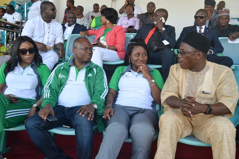 L-R: Heritage Bank Executive Directors, Adaeze Udensi, Jude Monye and Mary Akpobome with the Minister of Sports and Youth Development, Mr. Solomon Dalung, at the closing ceremony of the Heritage Bank-Lagos State Skoolimpics