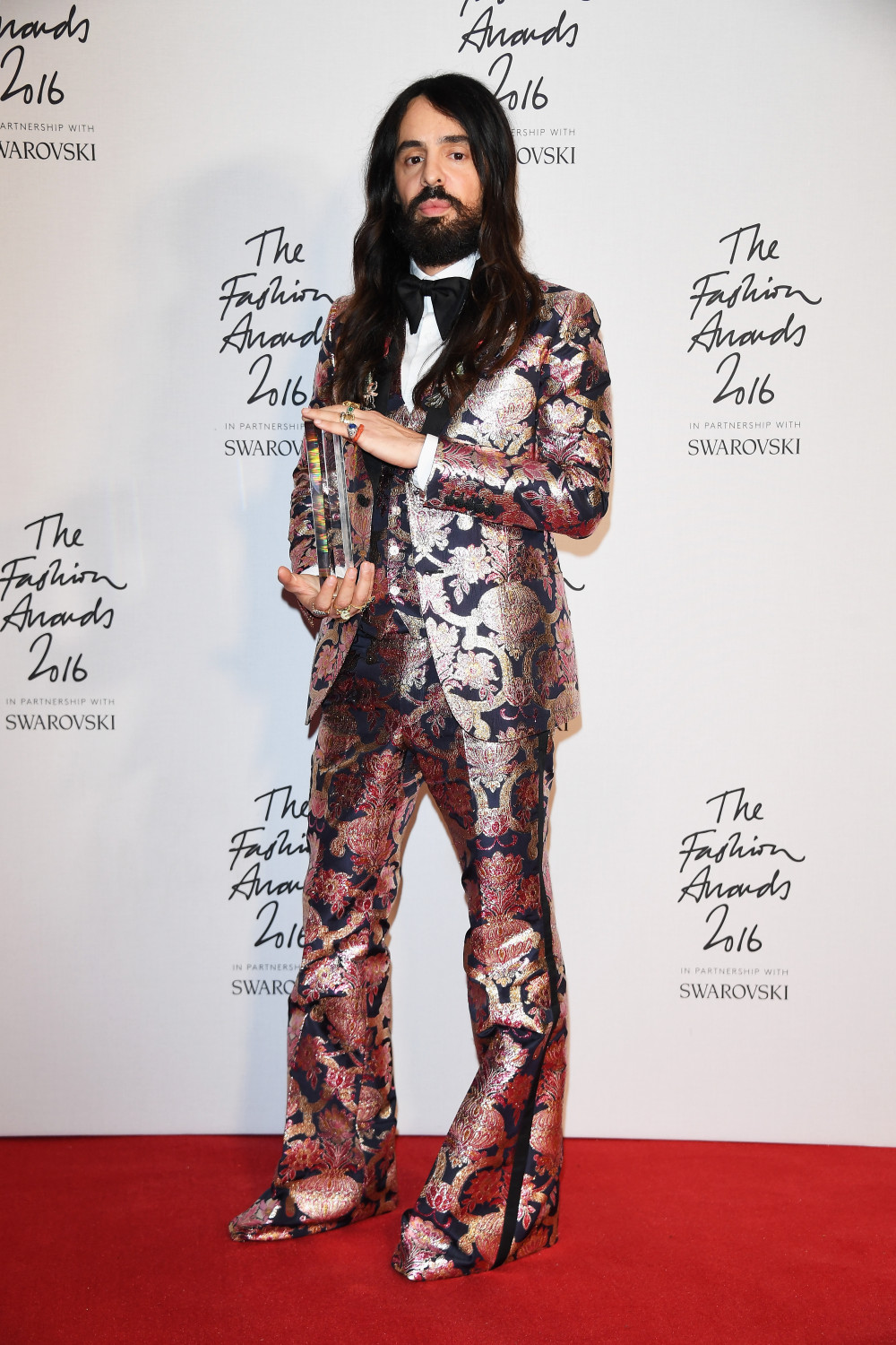 LONDON, ENGLAND - DECEMBER 05: Gucci Creative Director Alessandro Michele in the Winners Room with his award for best International Accessories Designer at the British Fashion Awards 2016 on December 5, 2016 in London, England. (Photo by Venturelli/Getty Images for GUCCI)