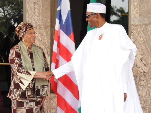 Pic.6. President Muhammdu Buhari (R) welcoming the visiting Liberian President, Mrs Ellen Johnson Sirleaf to the Presidential Villa in Abuja on Monday (5/12/16).  8856/5/12/2016/Callistus Ewelike/BJO/NAN