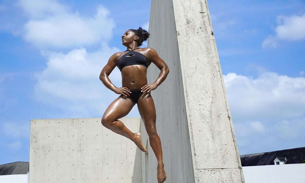 Olympic Gold Medalist Simone Biles shows off her toned Body in these Photos...