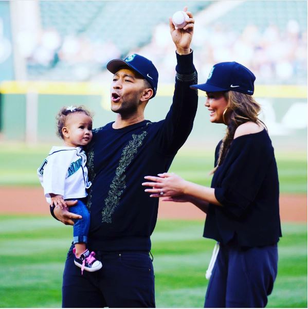 Too Adorable! Chrissy Teigen & John Legend’s 1-Year Old Daughter Luna has thrown her Very First Ceremonial Pitch