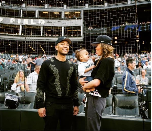 Too Adorable! Chrissy Teigen & John Legend’s 1-Year Old Daughter Luna has thrown her Very First Ceremonial Pitch