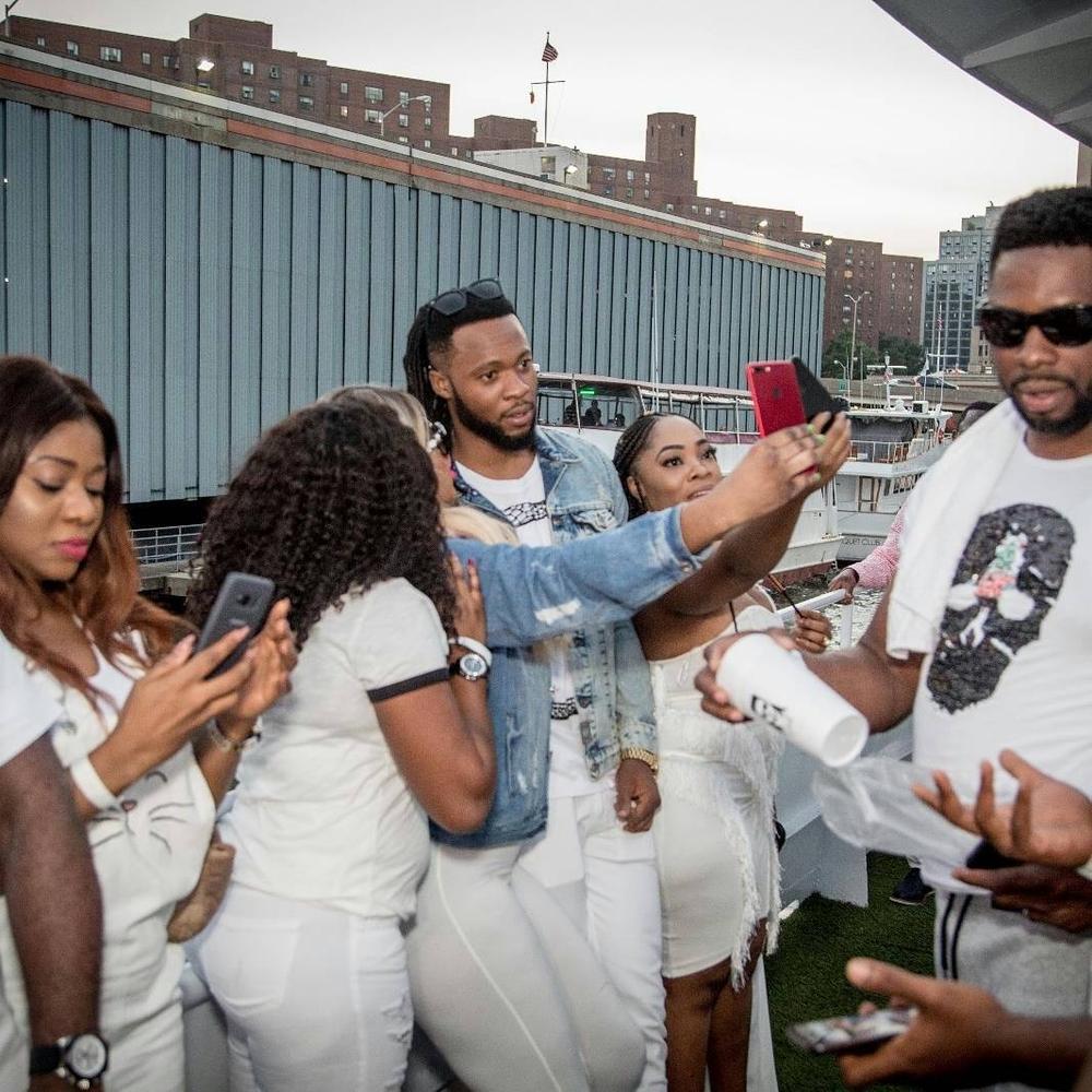 BellaNaija - Chief Obi, Masterkraft, Swanky Jerry... Photos from Flavour's All-White Cruise/Album Listening Party