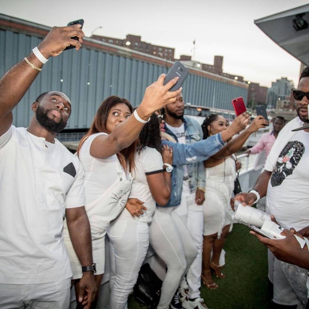 BellaNaija - Chief Obi, Masterkraft, Swanky Jerry... Photos from Flavour's All-White Cruise/Album Listening Party