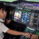 6-Year-Old Genius becomes Etihad's Pilot for a Day - BellaNaija