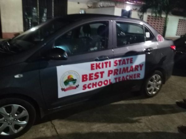 Fayose gifts 3 Ekiti State Teachers New Cars - BellaNaija