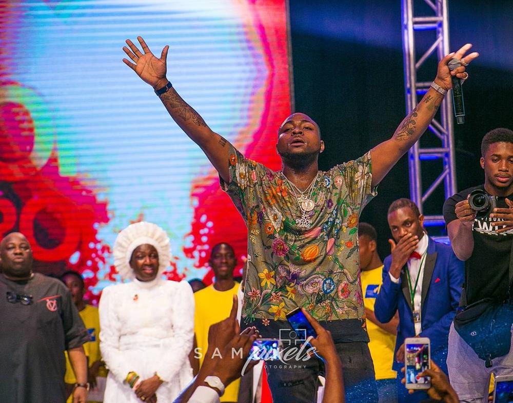 Season to Remember! Davido & Dele Momodu reconcile at Ovation Red Carol 2017