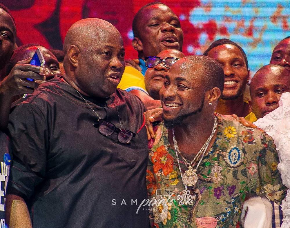 Season to Remember! Davido & Dele Momodu reconcile at Ovation Red Carol 2017