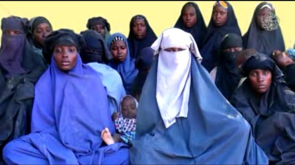 Boko Haram releases Video showing Shot Down Fighter Jet & Chibok Girls refusing to Go Home - BellaNaija