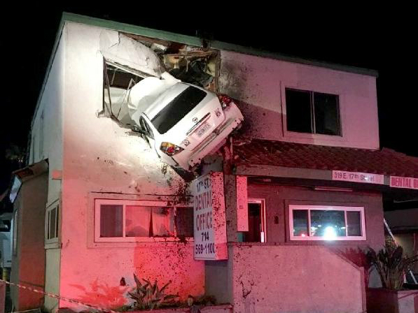 Car crashes into Upper Floor of Story-Building - BellaNaija