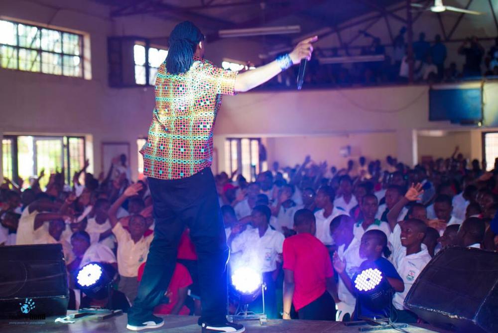 Korede Bello speaks and performs at Women's Day Outreach in Uganda