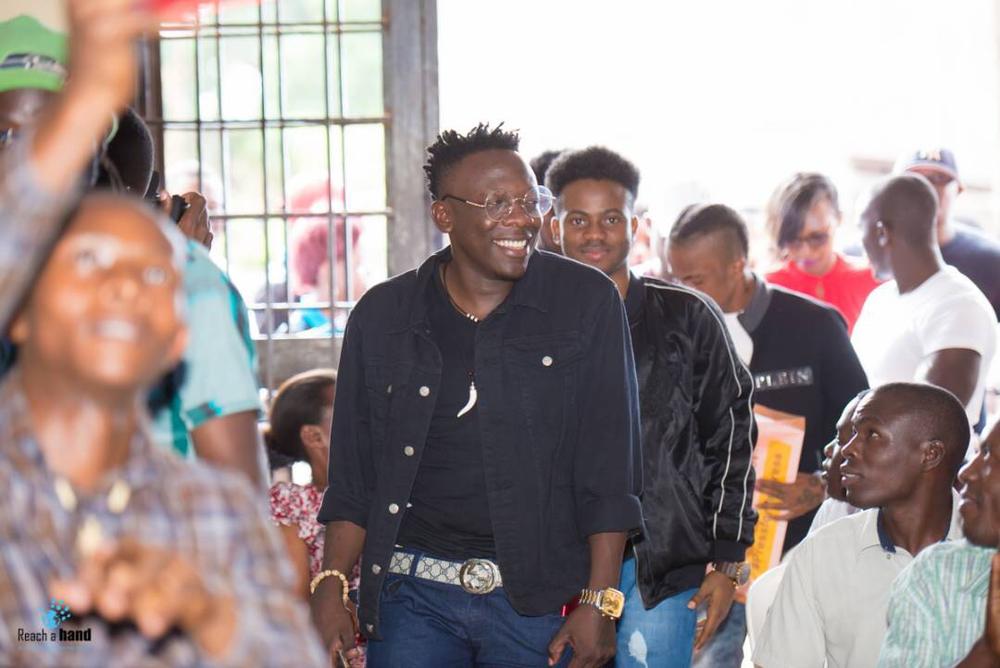 Korede Bello speaks and performs at Women's Day Outreach in Uganda