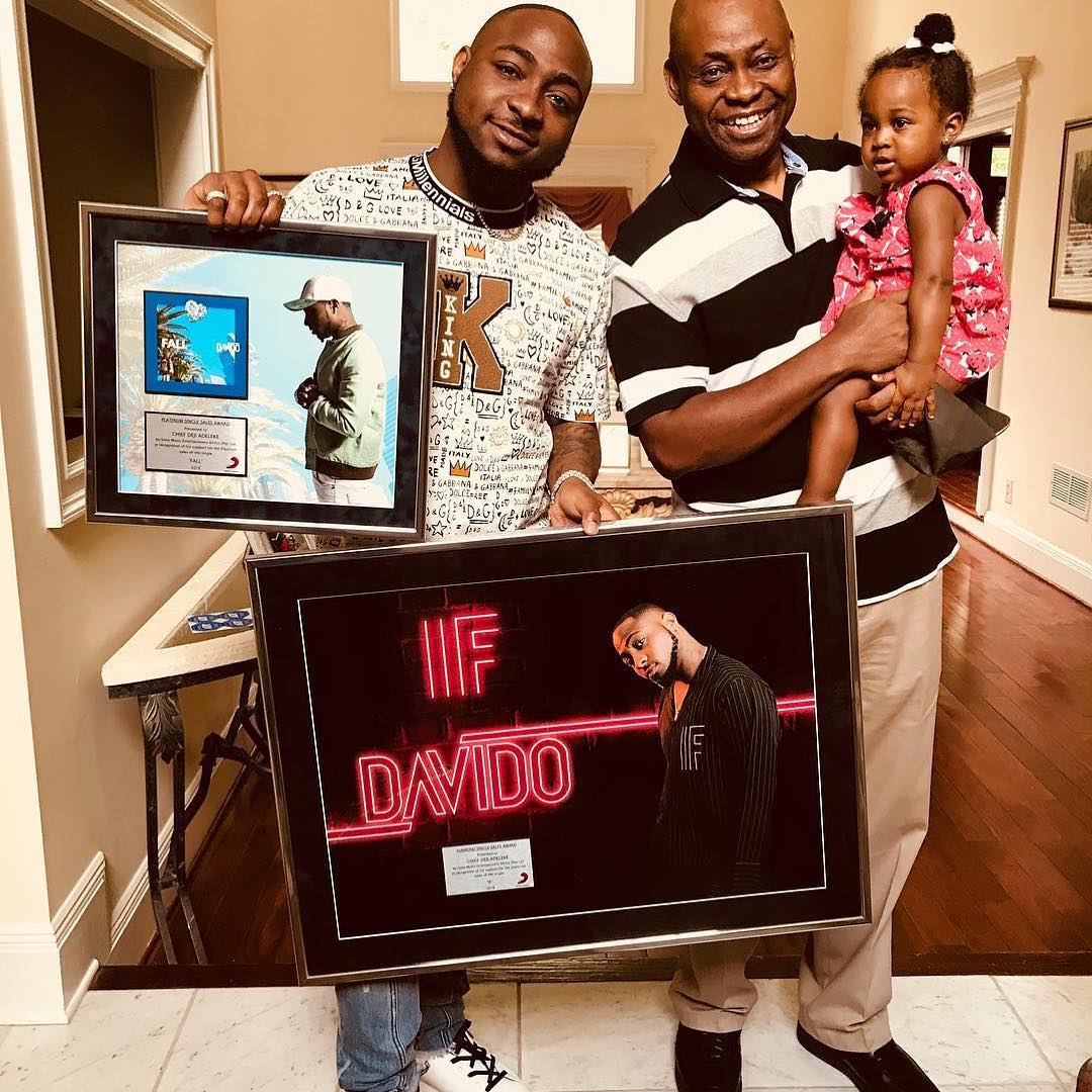 Davido dedicates "IF" & "Fall" Platinum plaques to Dad & Daughter