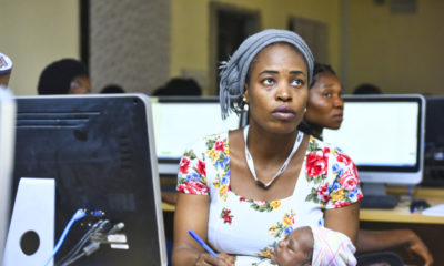 Woman with a baby at Tech event