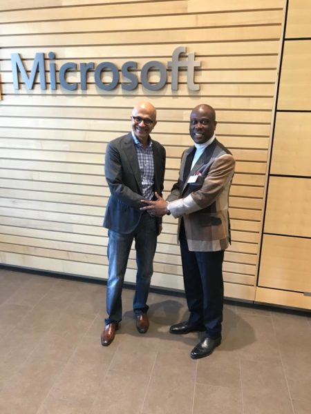 Microsoft Chief Executive Officer and Access Bank Managing Director shaking