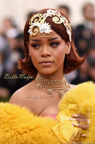 rihanna yellow dress met gala Rihanna's Best Red Carpet Looks Over the Years Yellow Dress Rihanna 2019 Met