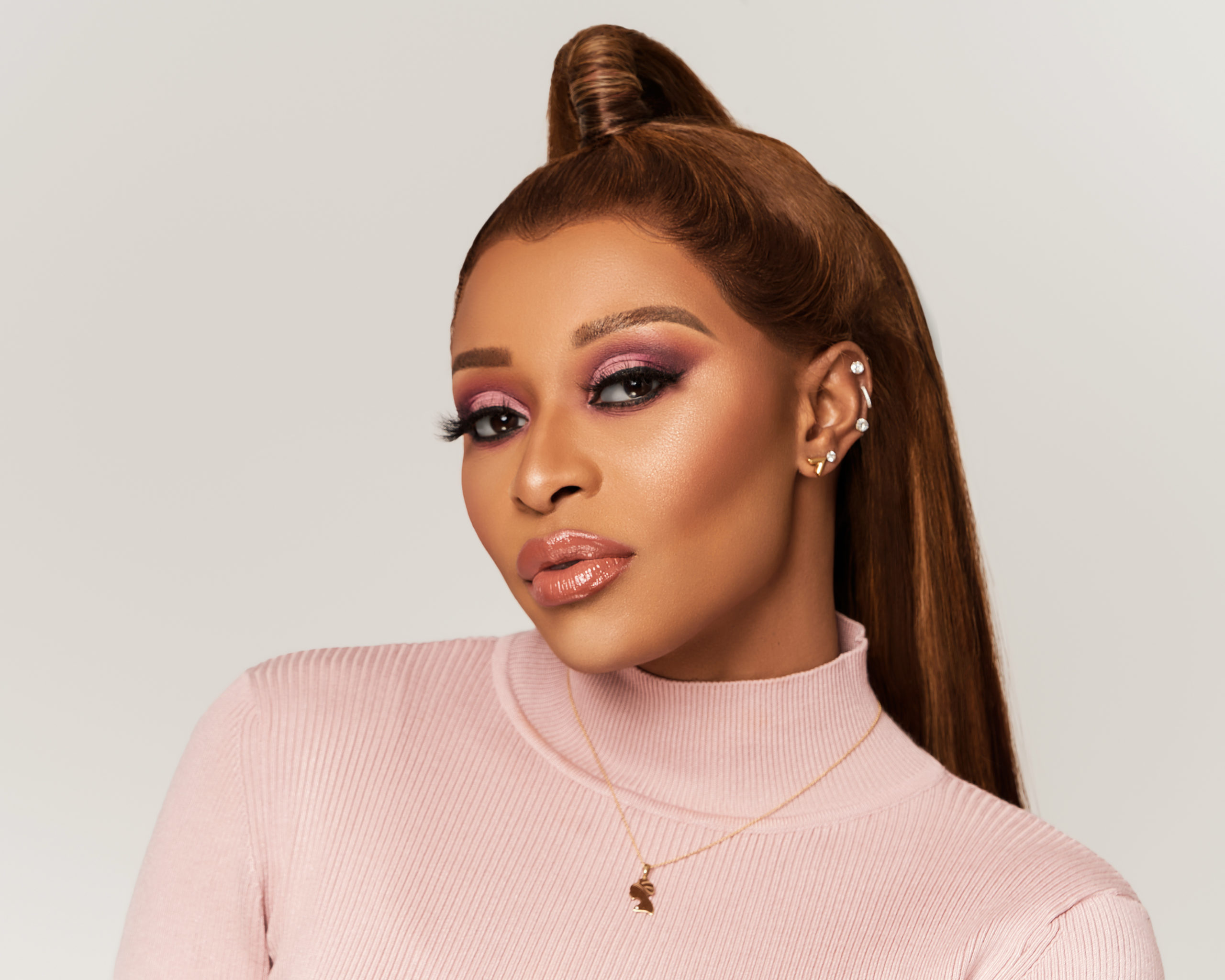 DJ Zinhle unveils Baby Bump in Teaser for Upcoming Reality Show 