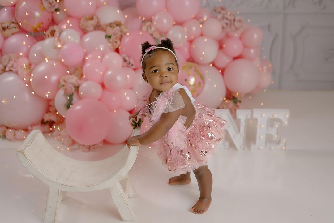Adewale & Kani Adeleke Share New Photos of Daughter Maya to Celebrate Her First Birthday