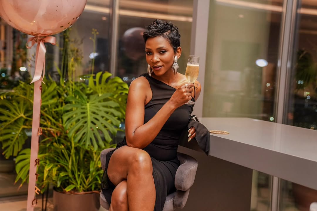 Genevieve Nnaji Celebrated Her Birthday in a Sleek Black Dress & Pixie Cut Perfection